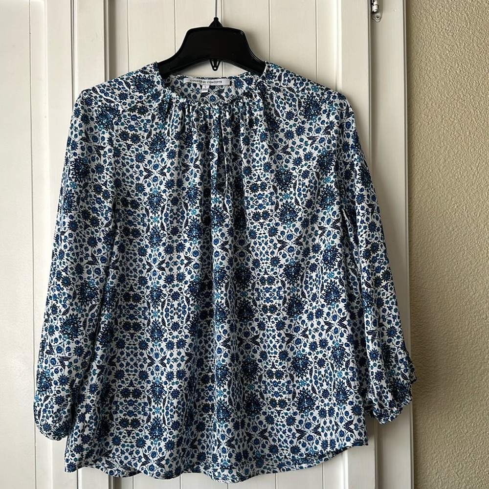 White blouse with blue flowers